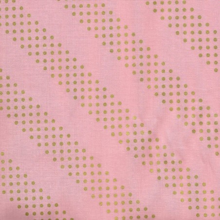 Tissu graphique doré fond rose 100% coton