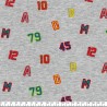 Tissu sweat chiffres et lettres fond gris chiné