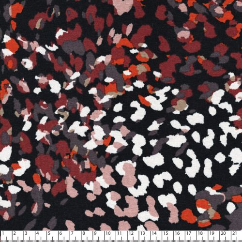 Tissu jersey viscose taches colorées fond noir