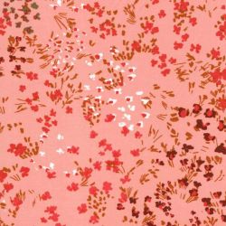 Tissu viscose champs fleuris fond rose saumon
