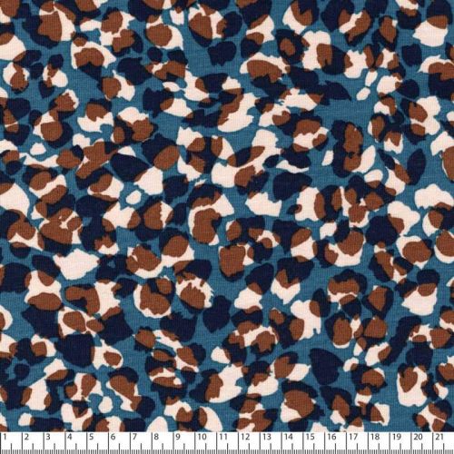 Tissu jersey fleurs façon Léo fond bleu