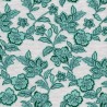 Tissu sweat fleurs vert émeraude fond beige chinée Tissu sweat fleurs vert émeraude fond beige chinée