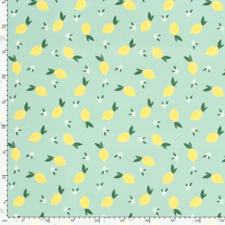 Tissu maillot de bain citrons fond vert UPF50