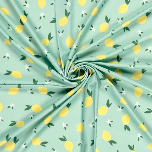 Tissu maillot de bain citrons fond vert UPF50