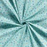 Tissu coton minis sapins fond menthe