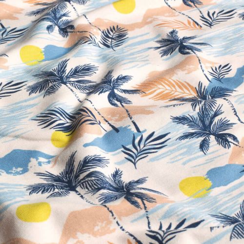 Tissu jersey palmiers fond blanc cassé