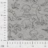 Tissu sweat minky dinos fond gris chiné Tissu sweat minky dinos fond gris chiné
