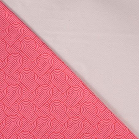 Tissu French Terry coeurs graphiques rose