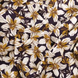 Tissu twill viscose stretch fleurs moutarde fond prune foncé