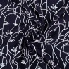 Tissu popeline viscose visages fond marine  Tissu popeline viscose visages fond marine