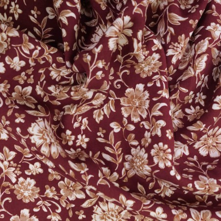 Tissu viscose radiance fleurs indiennes fond lie de vin 
