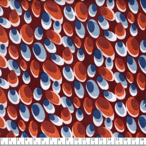 Tissu viscose twill stretch ovales fond terracotta