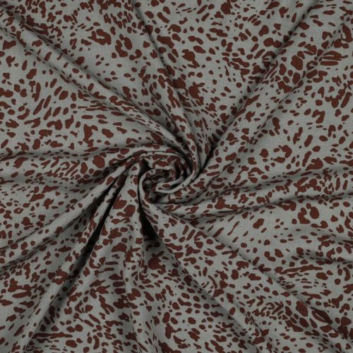 Tissu viscose jaguar fond vert mousse