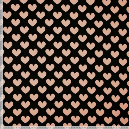 Tissu jersey coeur rose poudré fond noir