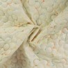 Tissu matelassé doudoune brodé fleur fond écru