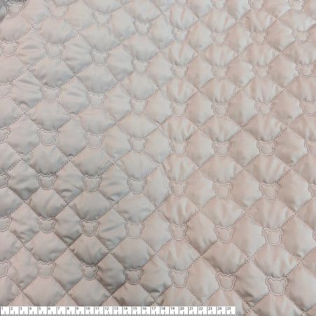 Tissu matelassé tête d'ours beige rosé