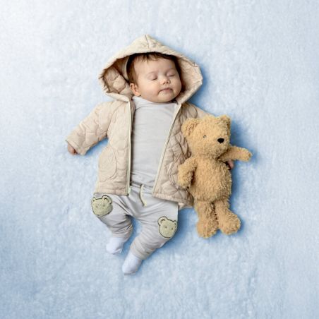 Tissu matelassé tête d'ours beige rosé
