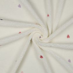 Tissu bouclette brodé coeurs fond écru