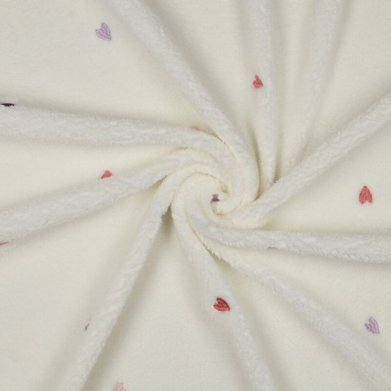Tissu bouclette brodé coeurs fond écru Tissu bouclette brodé coeurs fond écru