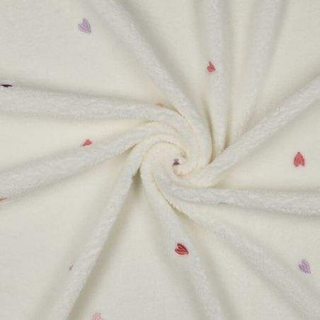 Tissu bouclette brodé coeurs fond écru